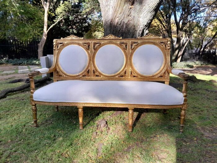A 20th Century French Style Ornately Carved Gilt Wood Set Comprising a Settee and Pair of Armchairs - Image 9