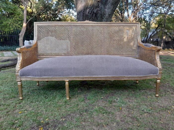 A French Style Hand-Gilded Bench / Settee With Rattan Back