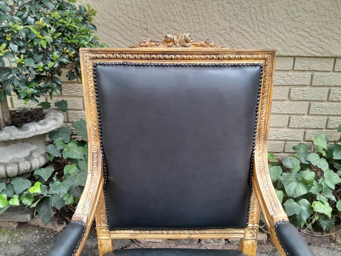 A 20th Century French Style Pair of Carved Gilt-Wood Arm Chairs Upholstered in Black Leather - Image 9
