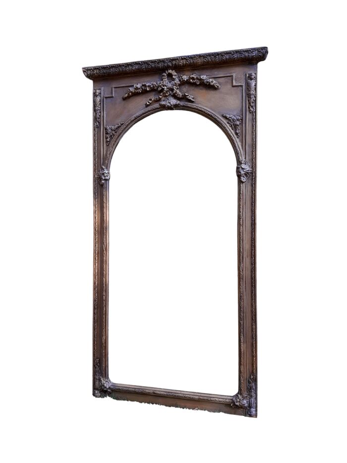 A French Style Ornately Carved and Gilded Bevelled Mirror of Large Proportions