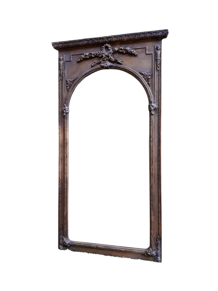 A French Style Ornately Carved and Gilded Bevelled Mirror of Large Proportions