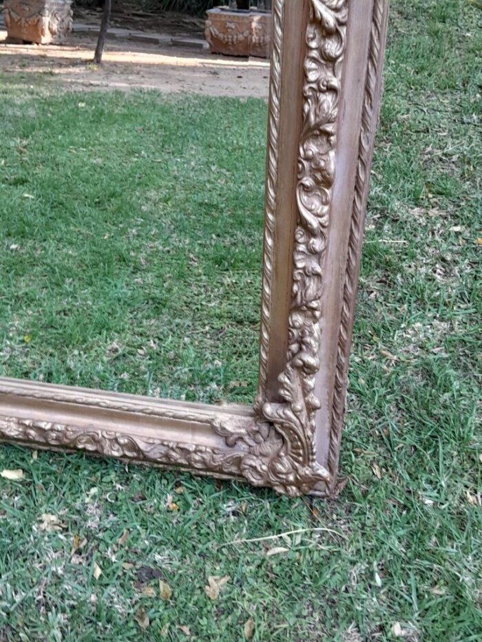 A French Rococo Style Ornately Carved & Gilded Bevelled Mirror - Image 4