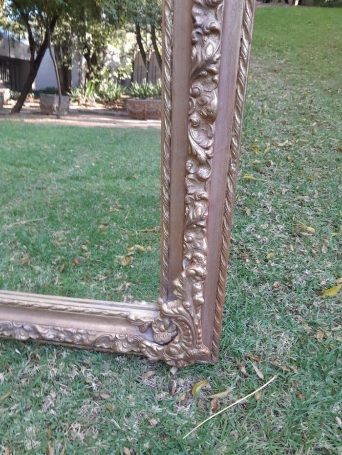 A French Rococo Style Ornately Carved & Gilded Bevelled Mirror - Image 4