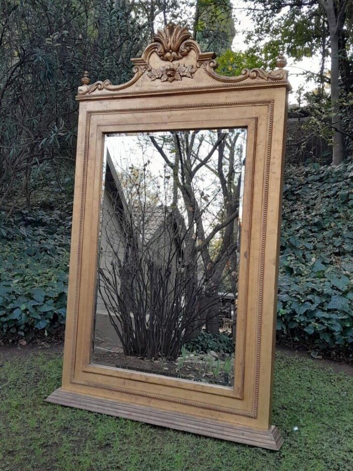 A Massive 20th Century French Style Ornately Carved and Gilded Bevelled Mirror - Image 4