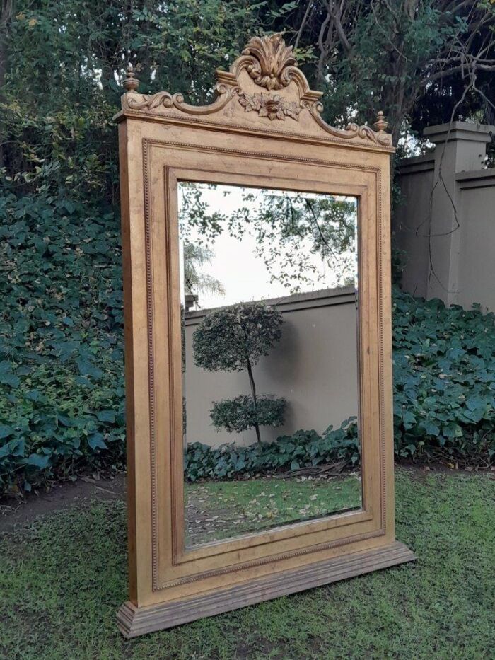A Massive 20th Century French Style Ornately Carved and Gilded Bevelled Mirror - Image 5