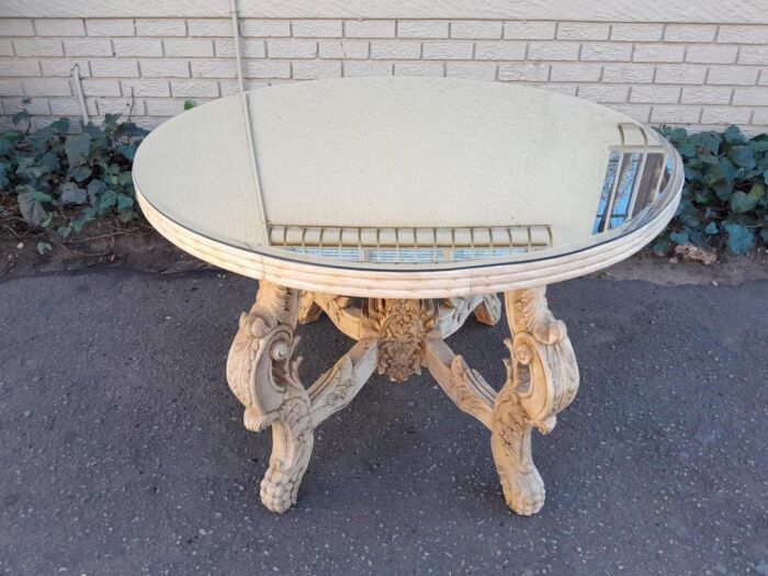 A 20th Century Ornately Carved Circular Wooden Table In A Contemporary Bleached Finish And With A Bevelled Mirror Top - Image 3