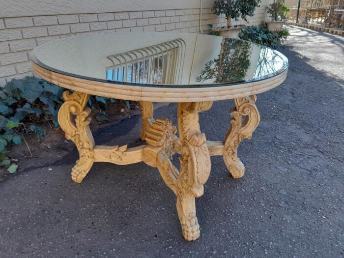 A 20th Century Ornately Carved Circular Wooden Table In A Contemporary Bleached Finish And With A Bevelled Mirror Top - Image 5