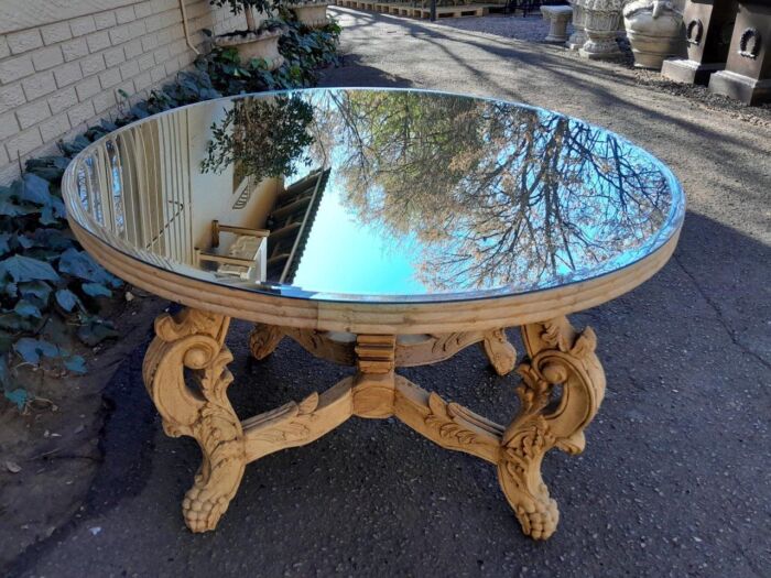 A 20th Century Ornately Carved Circular Wooden Table In A Contemporary Bleached Finish And With A Bevelled Mirror Top - Image 7