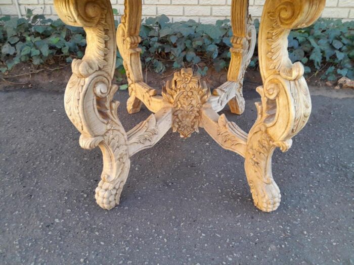 A 20th Century Ornately Carved Circular Wooden Table In A Contemporary Bleached Finish And With A Bevelled Mirror Top - Image 9