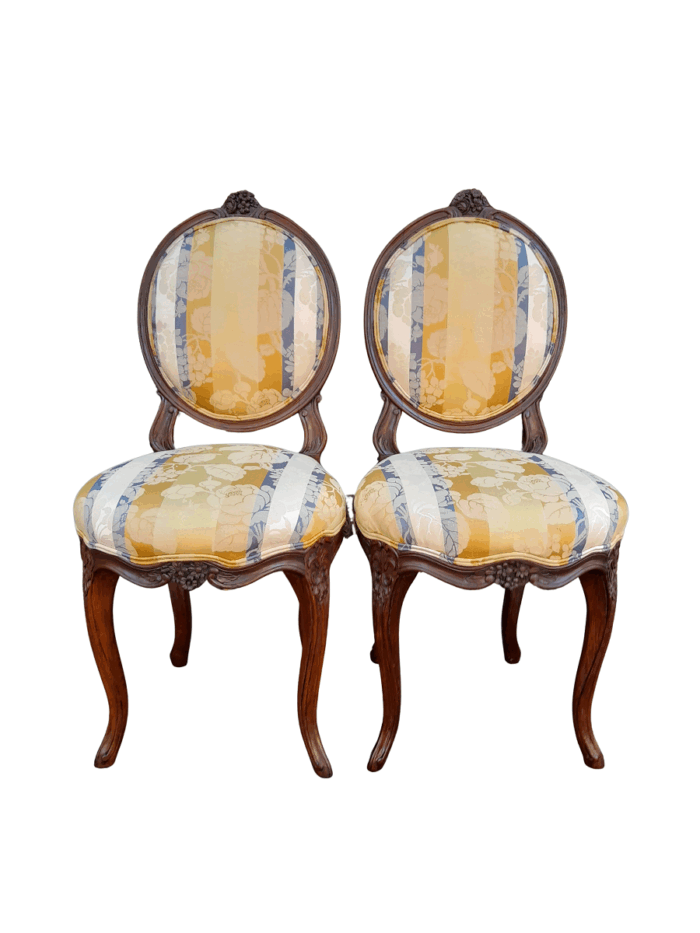 A Pair Of 19th Century French Carved Walnut Chairs