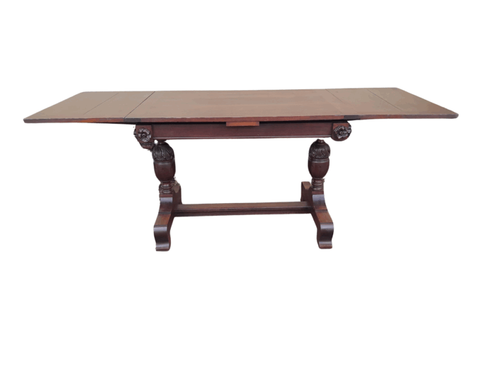 An Antique Edwardian Oak Dining Table With Two Extension Leaves