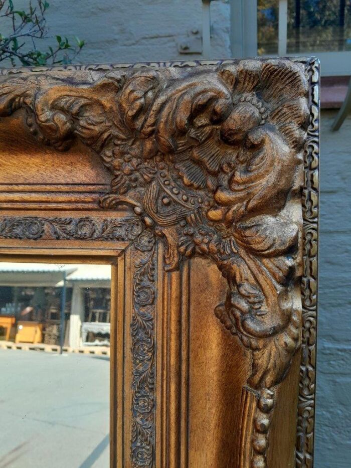 A 20th Century French Style Pair of Large and Ornately Carved Giltwood Mirrors - Image 9