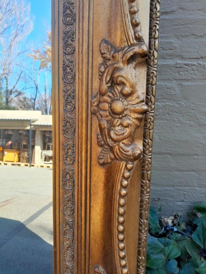 A 20th Century French Style Pair of Large and Ornately Carved Giltwood Mirrors - Image 10