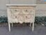 A 20th Century French Louis XV Style Ornately Carved Two Drawer Chest of Drawers in a Cotemporary Bleached Finish