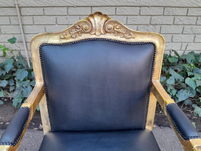 A 20th Century Near Pair  Of Victorian Style Hand-Gilded Mahogany Armchairs And Ottomans Upholstered In Leather - Image 7