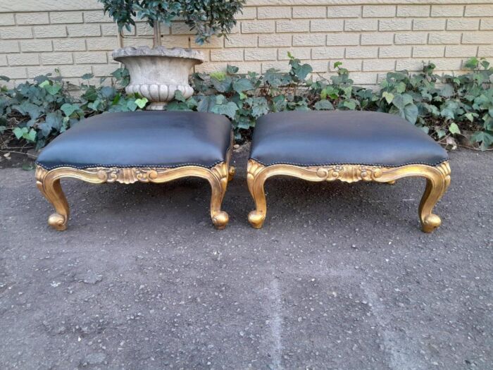 A 20th Century Near Pair  Of Victorian Style Hand-Gilded Mahogany Armchairs And Ottomans Upholstered In Leather - Image 8