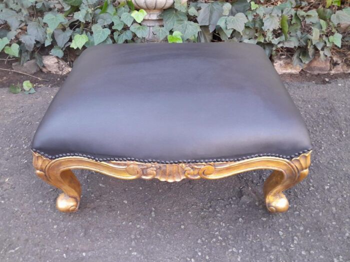 A 20th Century Near Pair  Of Victorian Style Hand-Gilded Mahogany Armchairs And Ottomans Upholstered In Leather - Image 9