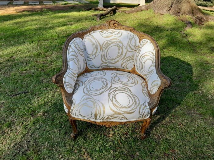 A Late 19th Century French Carved and Gilt Wood Walnut Bergere Armchair  Upholstered in  a custom made fabric for The Crown Collection - Image 3