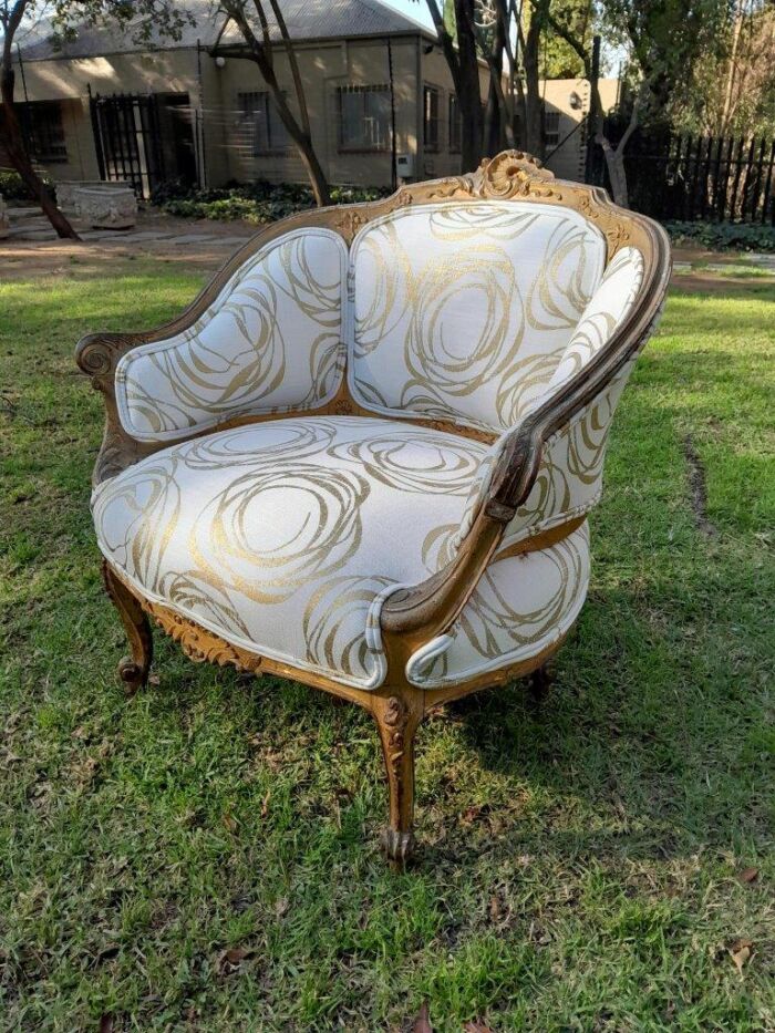 A Late 19th Century French Carved and Gilt Wood Walnut Bergere Armchair  Upholstered in  a custom made fabric for The Crown Collection - Image 4