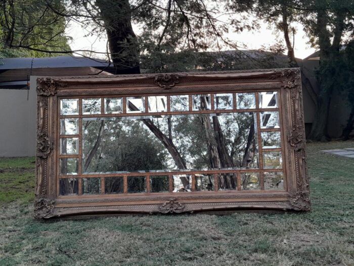 A 20th Century French Style Ornately Carved, Gilt Painted And Bevelled Mirror Of Large Proportions - Image 3