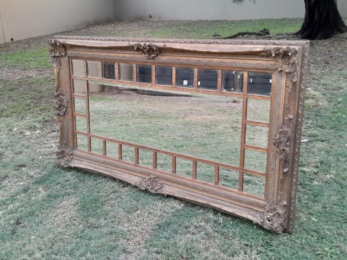 A 20th Century French Style Ornately Carved, Gilt Painted And Bevelled Mirror Of Large Proportions - Image 4