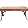 A 20th Century Victorian Style Mahogany Library Desk With  Original Gilt Tooled Leather Inserts On Castors