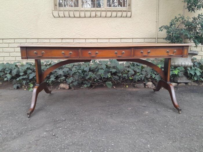 A 20th Century Victorian Style Mahogany Library Desk With  Original Gilt Tooled Leather Inserts On Castors - Image 2