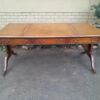 A 20th Century Victorian Style Mahogany Library Desk With  Original Gilt Tooled Leather Inserts On Castors - Image 3