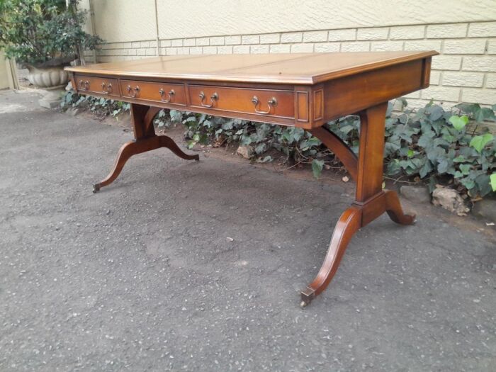 A 20th Century Victorian Style Mahogany Library Desk With  Original Gilt Tooled Leather Inserts On Castors - Image 5