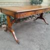 A 20th Century Victorian Style Mahogany Library Desk With  Original Gilt Tooled Leather Inserts On Castors - Image 6