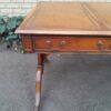 A 20th Century Victorian Style Mahogany Library Desk With  Original Gilt Tooled Leather Inserts On Castors - Image 9