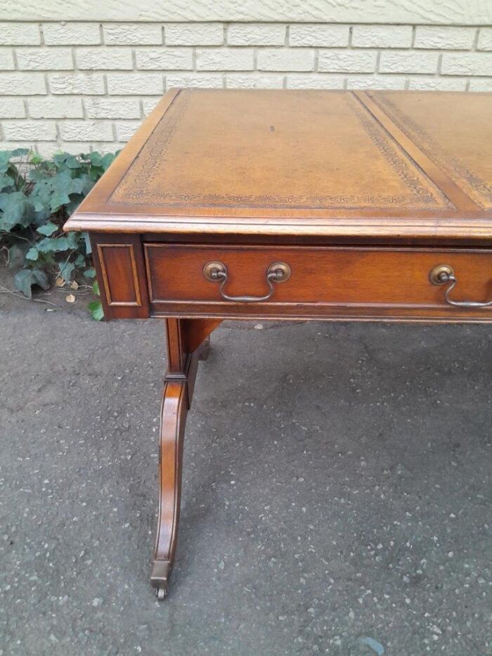 A 20th Century Victorian Style Mahogany Library Desk With  Original Gilt Tooled Leather Inserts On Castors - Image 9