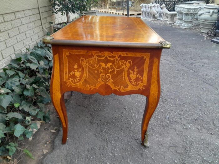 A 20th Century French Style Mahogany And Mahogany Marquetry Inlaid Desk With Brass Caps And Drawers - Image 6