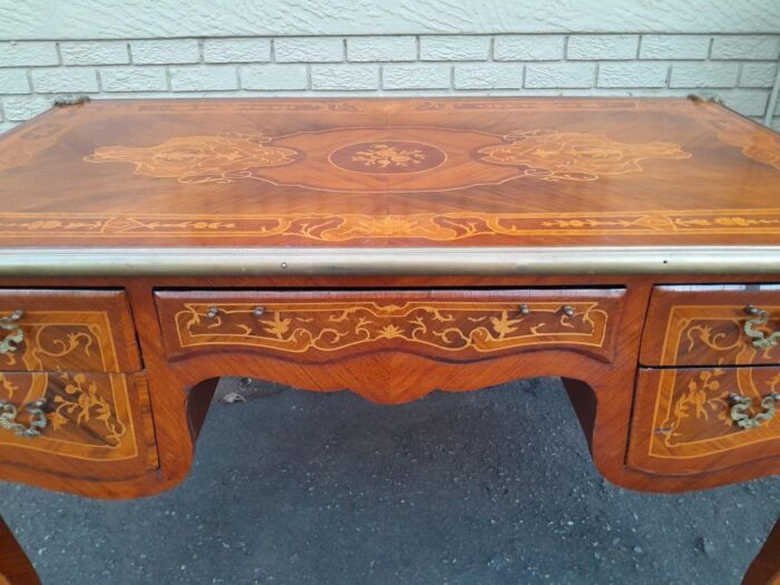 A 20th Century French Style Mahogany And Mahogany Marquetry Inlaid Desk With Brass Caps And Drawers - Image 9