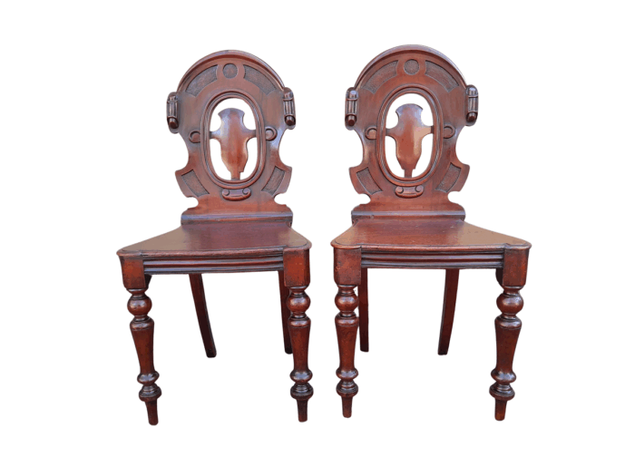 A  20TH Century Pair  of Victorian Carved Mahogany Hall Chairs