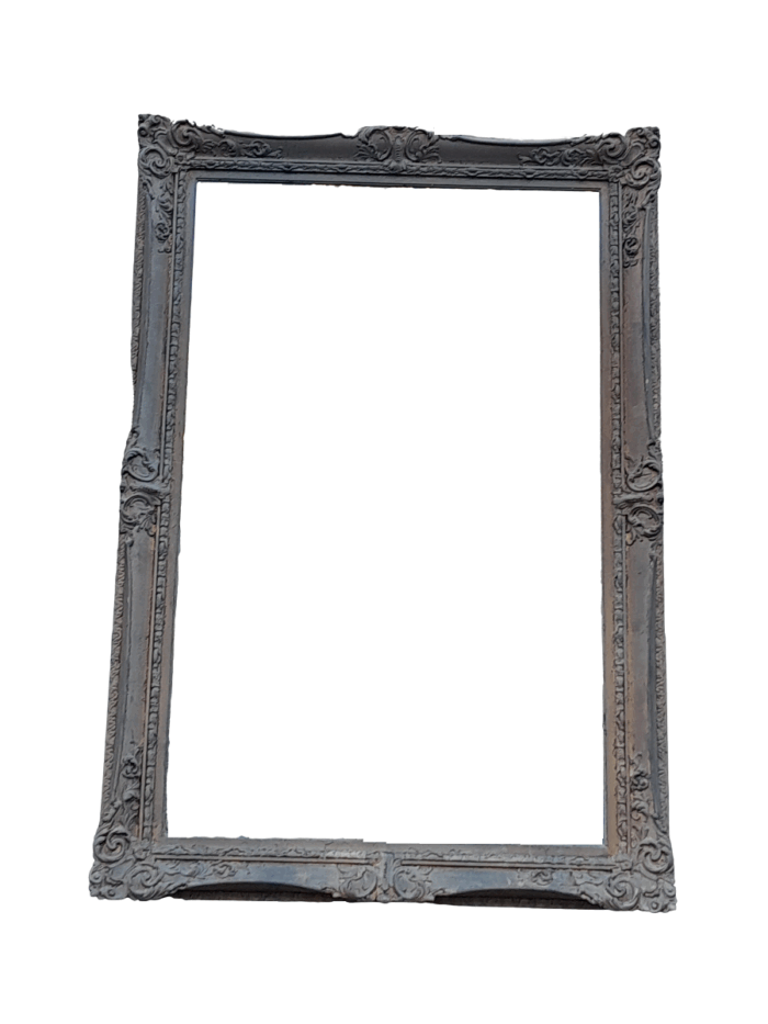 A 20th Century Large And Ornately Carved Gilded And Bevelled Mirror