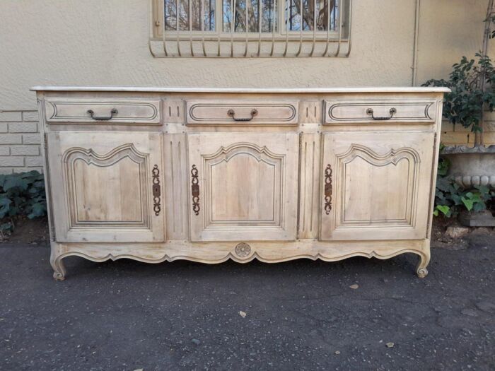 A 20TH Century French Walnut Sideboard with Original Iron hinges in a Contemporary Bleached Finish - Image 2