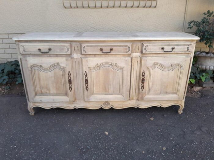 A 20TH Century French Walnut Sideboard with Original Iron hinges in a Contemporary Bleached Finish - Image 3