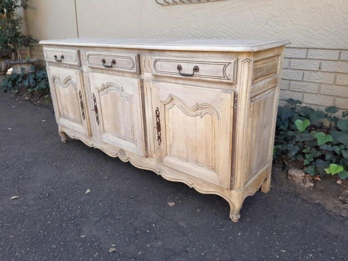 A 20TH Century French Walnut Sideboard with Original Iron hinges in a Contemporary Bleached Finish - Image 5