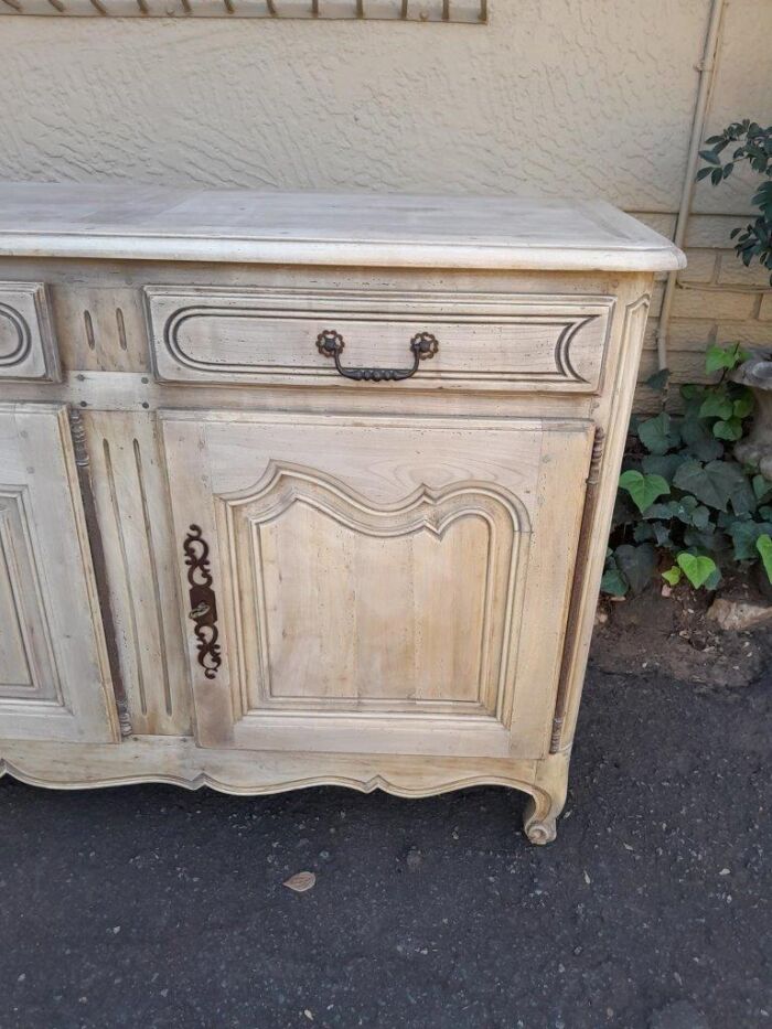A 20TH Century French Walnut Sideboard with Original Iron hinges in a Contemporary Bleached Finish - Image 8