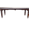 A 19th Century Antique Victorian Mahogany Extending Dining Table with Heavily Carved Legs on Brass Castors