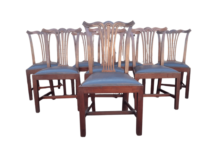 A 20th Century Set Of  Eight Carved Mahogany George Lll Style Dining Chairs Upholstered In Leather