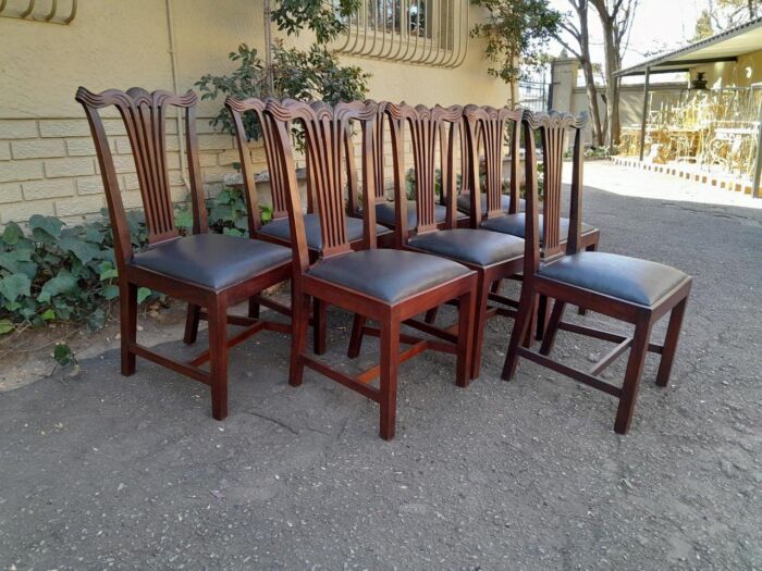A 20th Century Set Of  Eight Carved Mahogany George Lll Style Dining Chairs Upholstered In Leather - Image 6