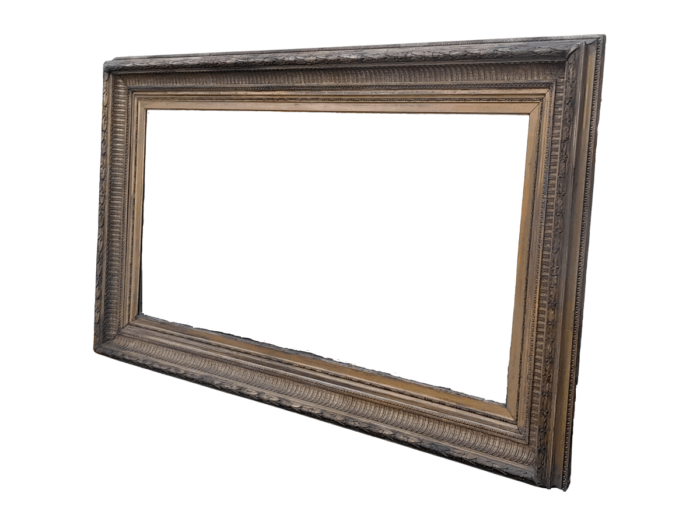 A 19th Century Carved Giltwood And Gesso Mirror Of Large Proportions