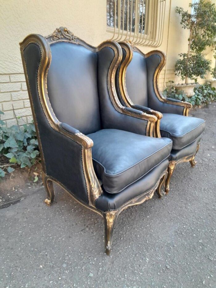A Circa 1900s French Style Pair Of Carved Giltwood Wingback Chairs Upholstered In Leather - Image 4