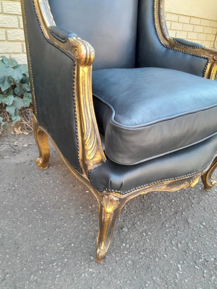 A Circa 1900s French Style Pair Of Carved Giltwood Wingback Chairs Upholstered In Leather - Image 6