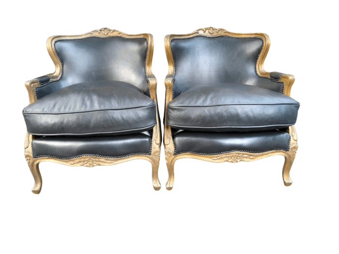 A 20th Century Pair of French Style Carved Giltwood Armchairs Upholstered in Leather