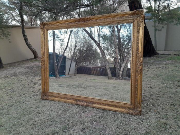A Massive 20TH Century French Style Ornately Carved And Gilded Bevelled Mirror Of Large Proportions - Image 4