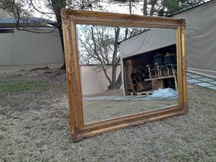 A Massive 20TH Century French Style Ornately Carved And Gilded Bevelled Mirror Of Large Proportions - Image 5