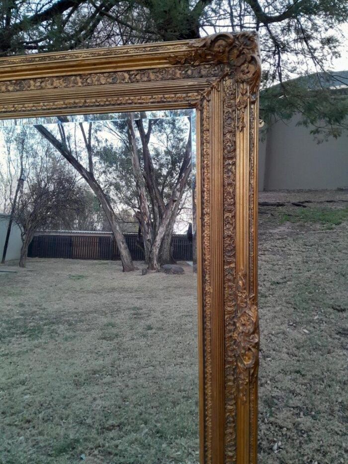 A Massive 20TH Century French Style Ornately Carved And Gilded Bevelled Mirror Of Large Proportions - Image 8